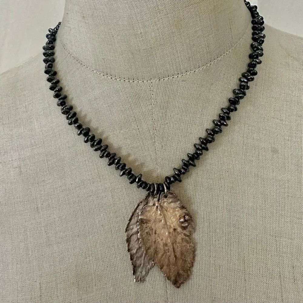 Artisan Hematite Bead Necklace with Electroplated Leaf Pendant